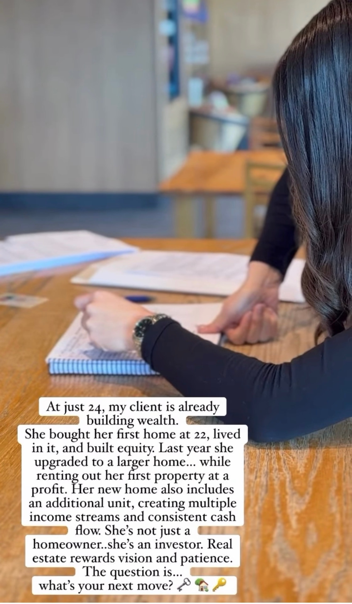 Taty Recinos reviewing real estate documents with a client building long-term wealth through property investment